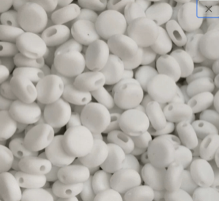 White silicone beads used as buckles to create adjustable fitting elastic for face masks